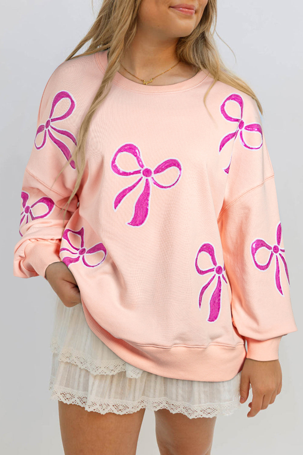 Glitz & Grace Sweatshirt – Apricot Pink Sequin Bow Oversized Pullover